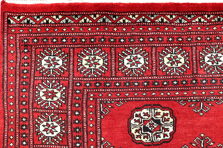 Red Bokhara Rug 4' 11" x 8' 2" Hand-Knotted | No. QA97624