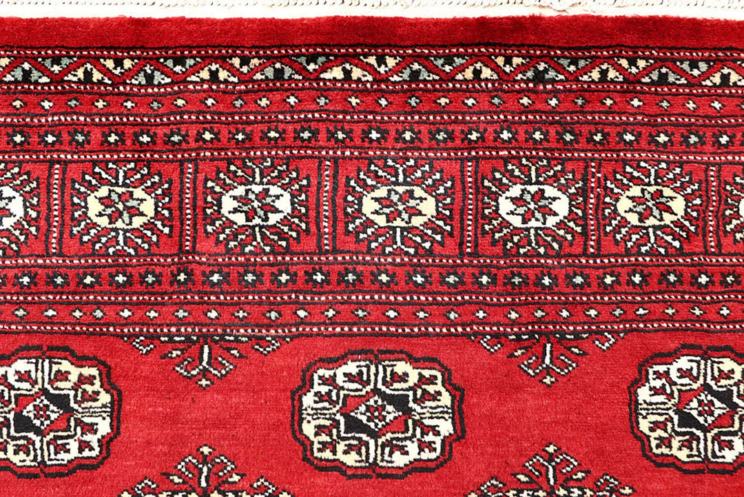 Red Bokhara Rug 4' 11" x 8' 2" Hand-Knotted | No. QA97624