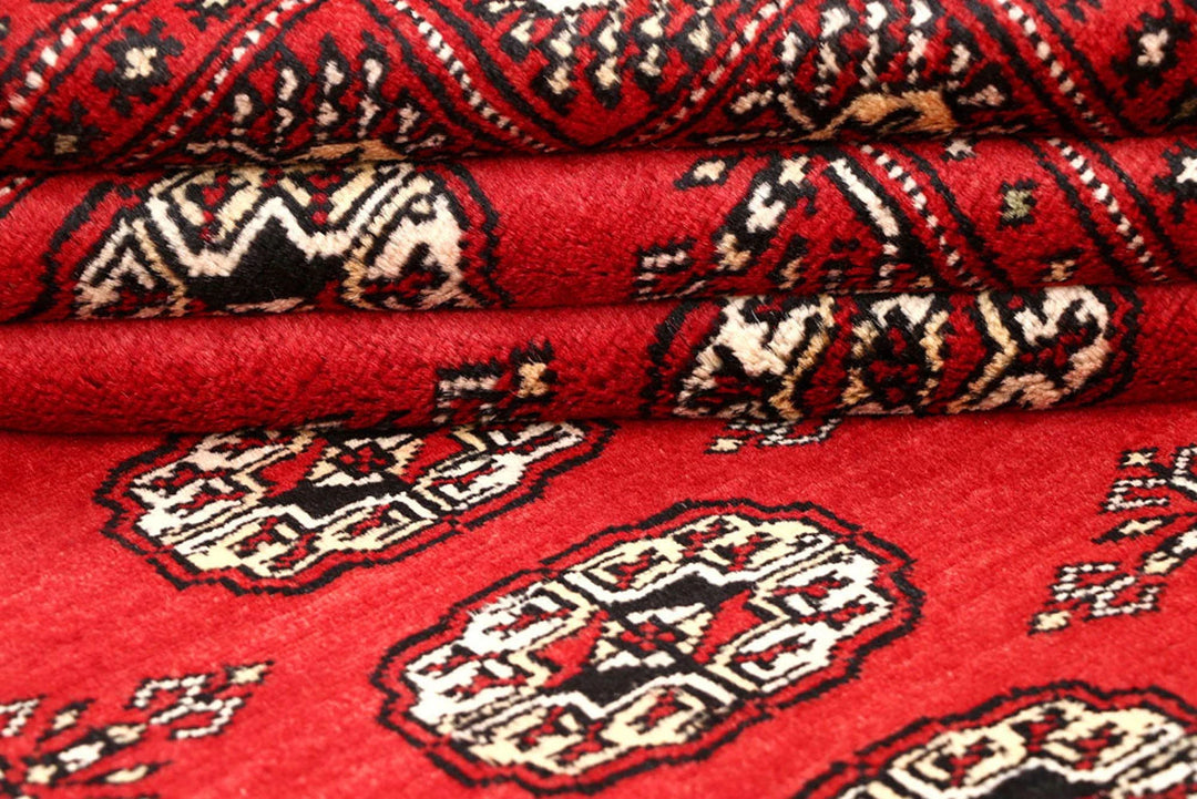 Red Bokhara Rug 4' 11" x 8' 2" Hand-Knotted | No. QA97624