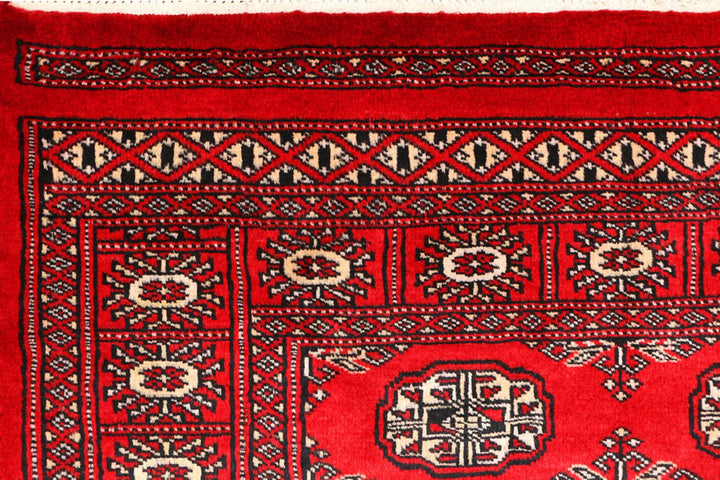 Red Pakistani Bokhara Rug 3' 1" x 5' 2" Hand-Knotted | No. QA97640