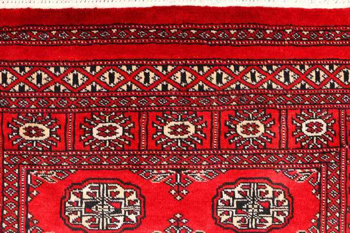 Red Pakistani Bokhara Rug 3' 1" x 5' 2" Hand-Knotted | No. QA97640