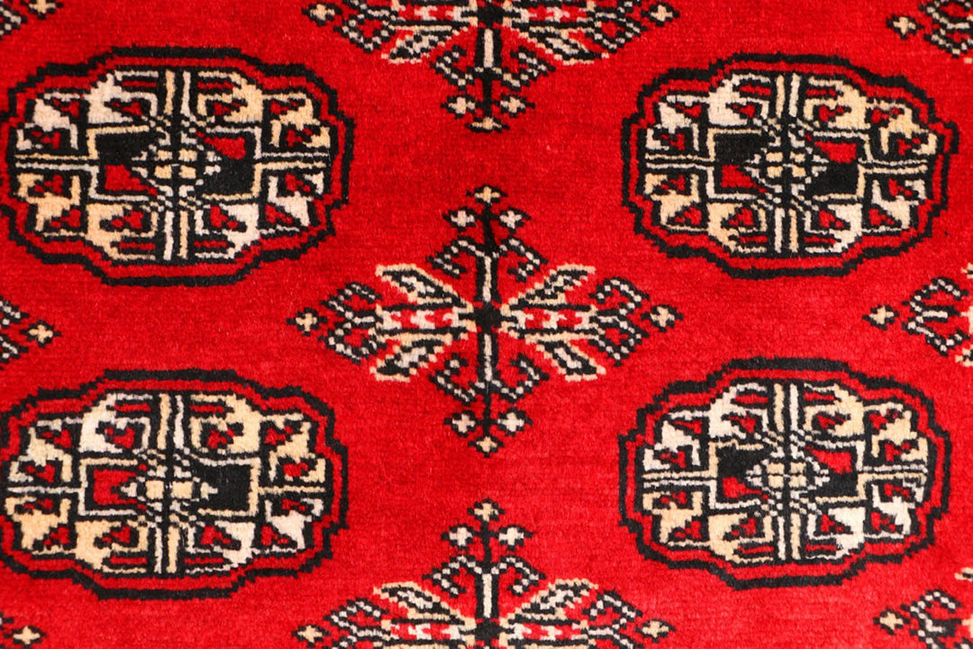 Red Pakistani Bokhara Rug 3' 1" x 5' 2" Hand-Knotted | No. QA97640