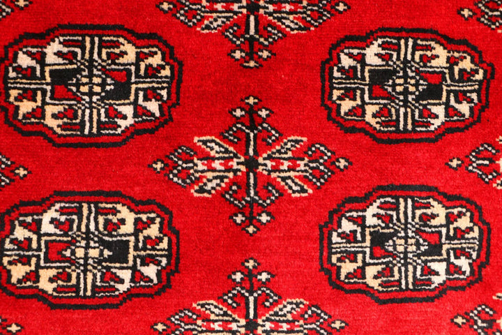 Red Pakistani Bokhara Rug 3' 1" x 5' 2" Hand-Knotted | No. QA97640