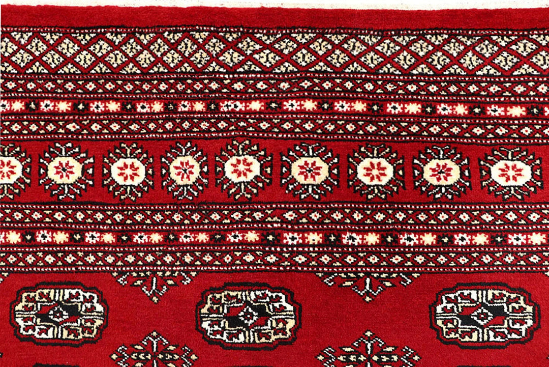 Red Pakistani Bokhara Rug 8' 1" x 10' 1" Hand-Knotted | No. QA97650