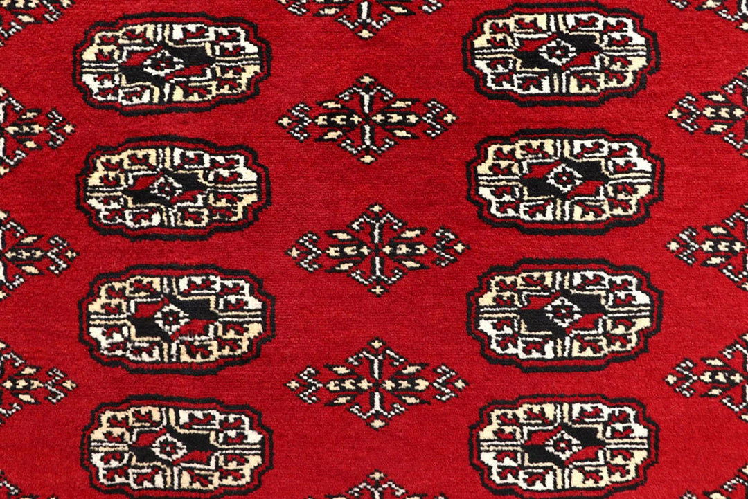 Red Pakistani Bokhara Rug 8' 1" x 10' 1" Hand-Knotted | No. QA97650