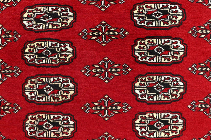 Red Pakistani Bokhara Rug 8' 1" x 10' 1" Hand-Knotted | No. QA97650