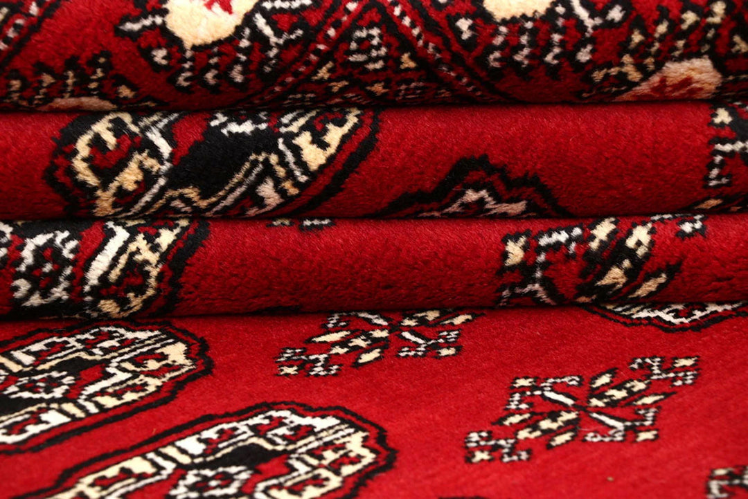 Red Pakistani Bokhara Rug 8' 1" x 10' 1" Hand-Knotted | No. QA97650