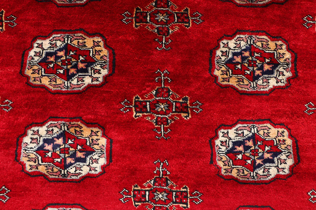 Firebrick Red Pakistani Bokhara Rug 4' 2" x 6' 4" Hand-Knotted | No. QA97788