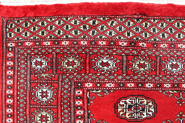 Red Pakistani Bokhara Rug 5' 6" x 8' Hand-Knotted | No. QA98186