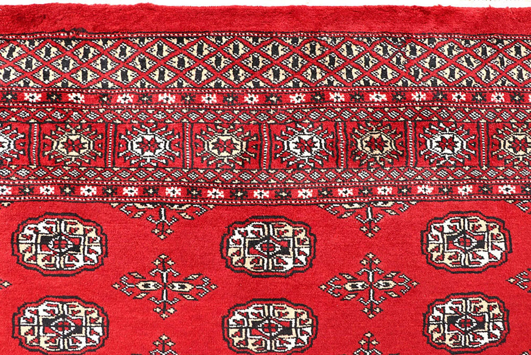 Red Pakistani Bokhara Rug 5' 6" x 8' Hand-Knotted | No. QA98186