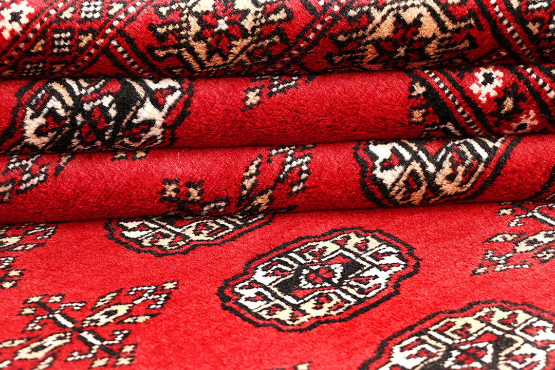 Red Pakistani Bokhara Rug 5' 6" x 8' Hand-Knotted | No. QA98186
