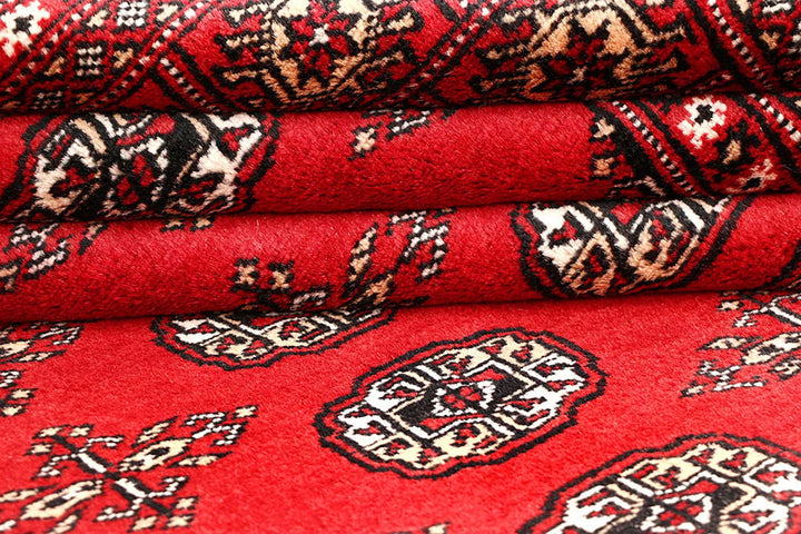 Red Pakistani Bokhara Rug 5' 6" x 8' Hand-Knotted | No. QA98186