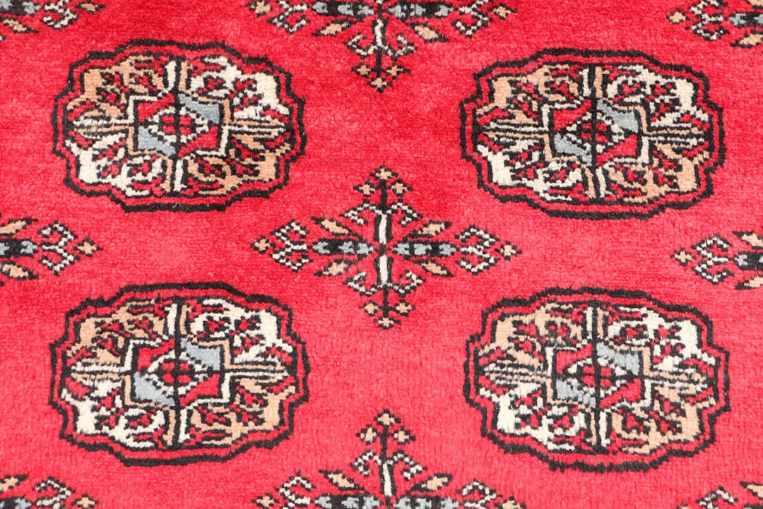 Red Pakistani Bokhara Rug 3' 2" x 5' 2" Hand-Knotted | No. QA98211