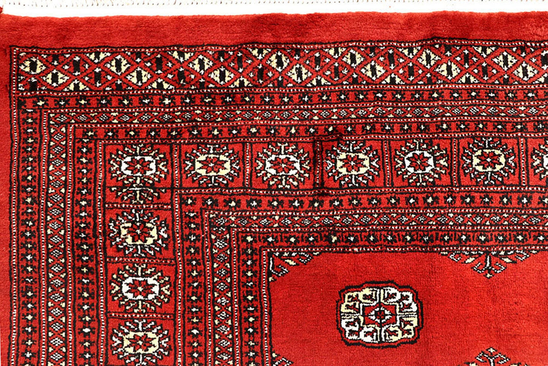 Red Pakistani Bokhara Rug 9' x 12' 3" Hand-Knotted | No. QA98355