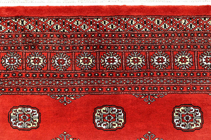 Red Pakistani Bokhara Rug 9' x 12' 3" Hand-Knotted | No. QA98355