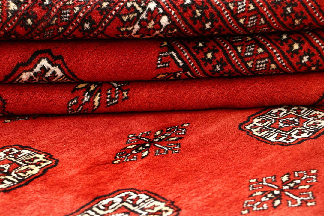 Red Pakistani Bokhara Rug 9' x 12' 3" Hand-Knotted | No. QA98355