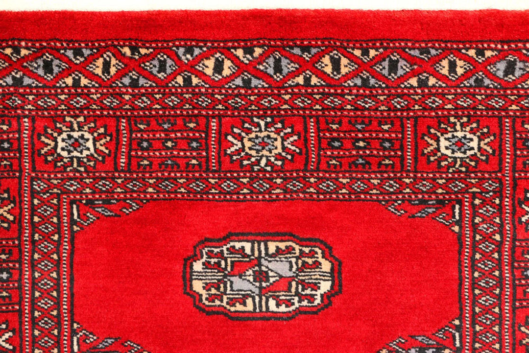 Dark Red Pakistani Bokhara Rug 2' 7" x 8' 10" Hand-Knotted | No. QA98708