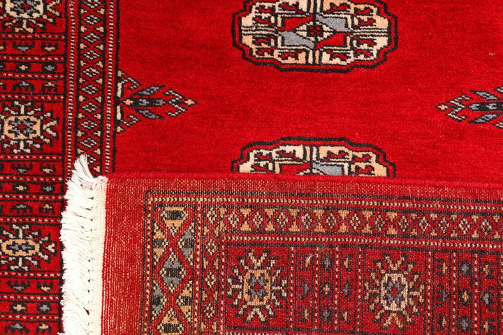 Dark Red Pakistani Bokhara Rug 2' 7" x 8' 10" Hand-Knotted | No. QA98708