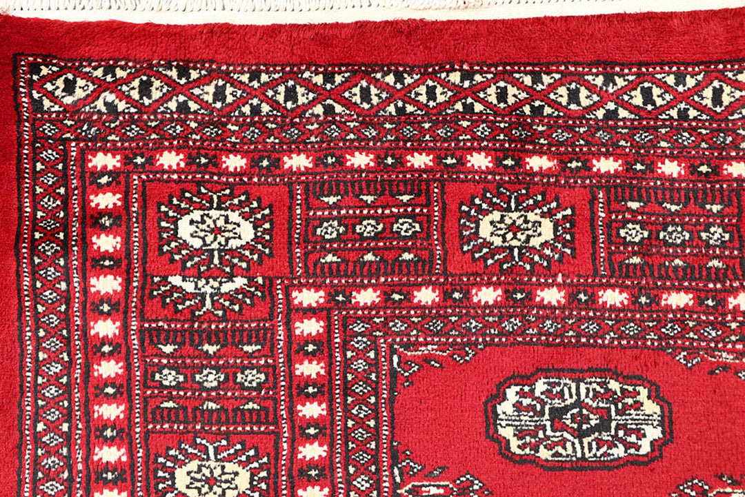 Red Pakistani Bokhara Rug 4' 2" x 6' 4" Hand-Knotted | No. QA98722