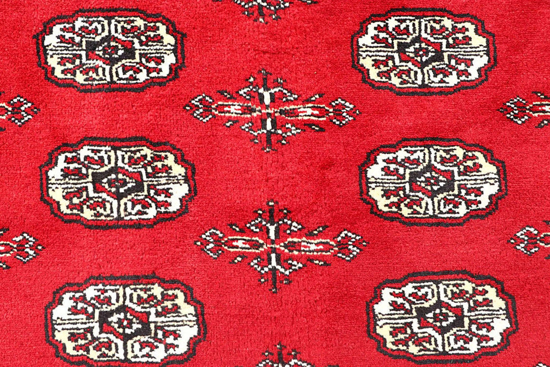 Red Pakistani Bokhara Rug 4' 2" x 6' 4" Hand-Knotted | No. QA98722
