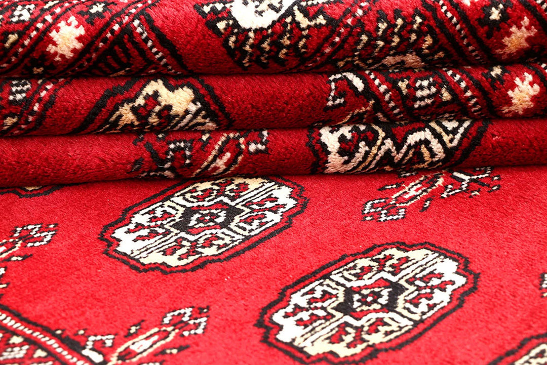 Red Pakistani Bokhara Rug 4' 2" x 6' 4" Hand-Knotted | No. QA98722
