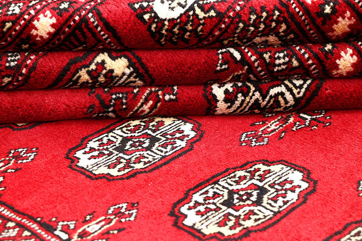 Red Pakistani Bokhara Rug 4' 2" x 6' 4" Hand-Knotted | No. QA98722