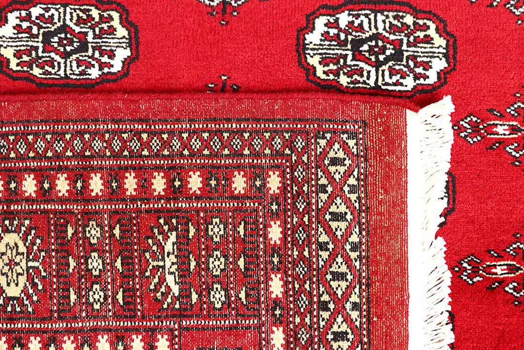 Red Pakistani Bokhara Rug 4' 2" x 6' 4" Hand-Knotted | No. QA98722