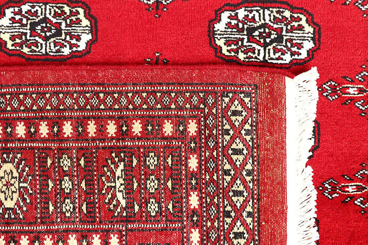 Red Pakistani Bokhara Rug 4' 2" x 6' 4" Hand-Knotted | No. QA98722