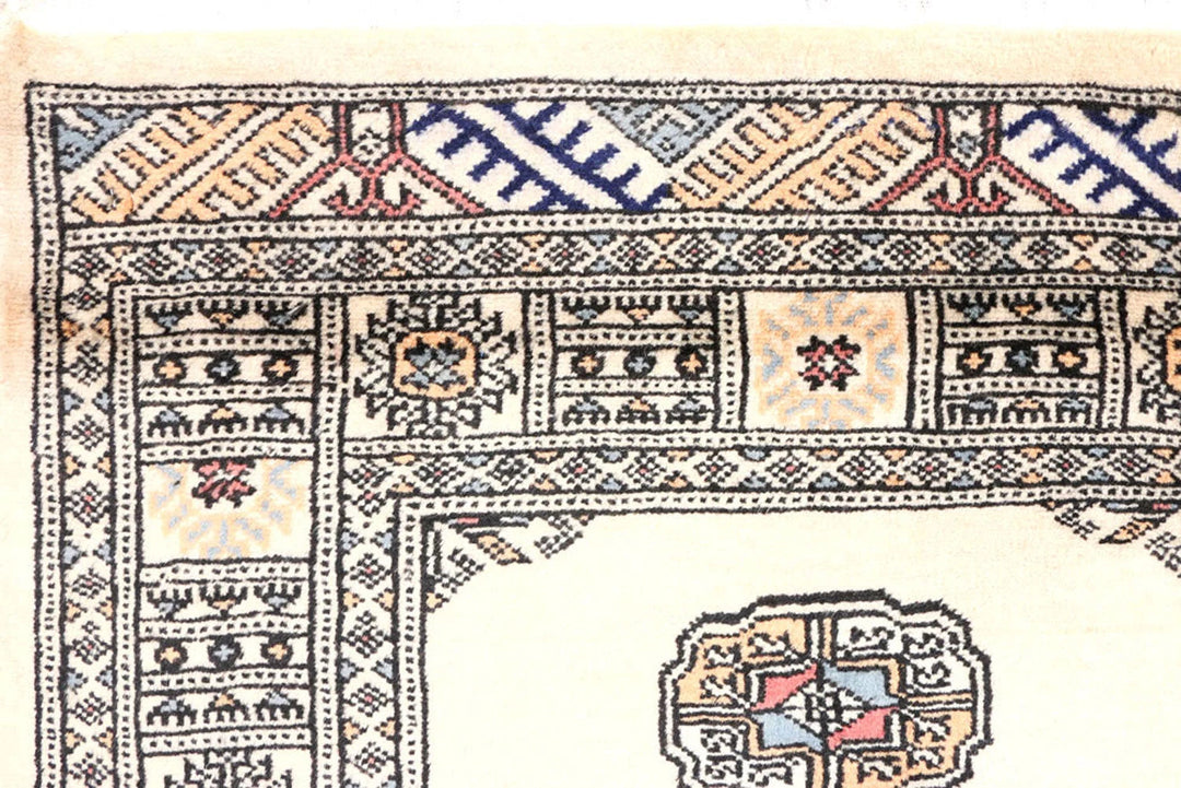 Ivory Pakistani Bokhara Rug 2' 6" x 9' 5" Hand-Knotted | No. QA98855