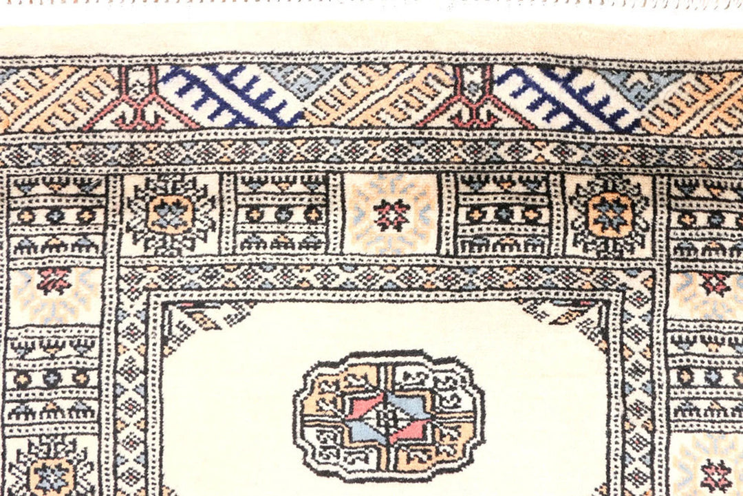 Ivory Pakistani Bokhara Rug 2' 6" x 9' 5" Hand-Knotted | No. QA98855