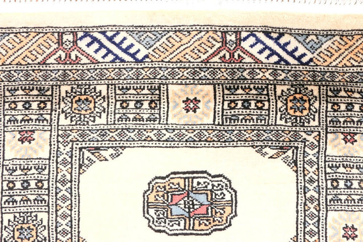 Ivory Pakistani Bokhara Rug 2' 6" x 9' 5" Hand-Knotted | No. QA98855