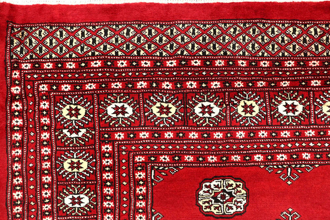 Firebrick Pakistani Bokhara Rug 6' 2" x 9' 1" Hand-Knotted | No. QA98989