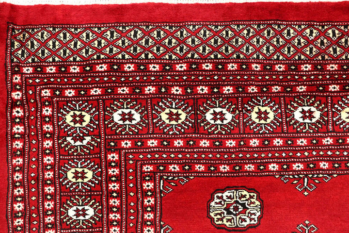 Firebrick Pakistani Bokhara Rug 6' 2" x 9' 1" Hand-Knotted | No. QA98989