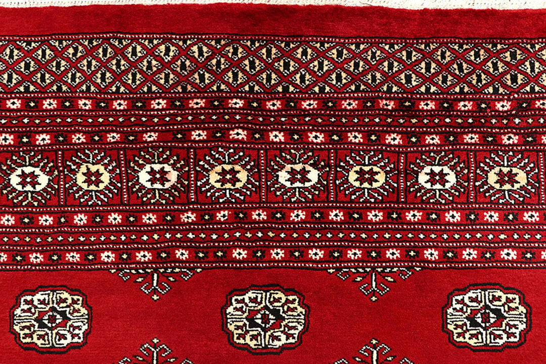 Firebrick Pakistani Bokhara Rug 6' 2" x 9' 1" Hand-Knotted | No. QA98989