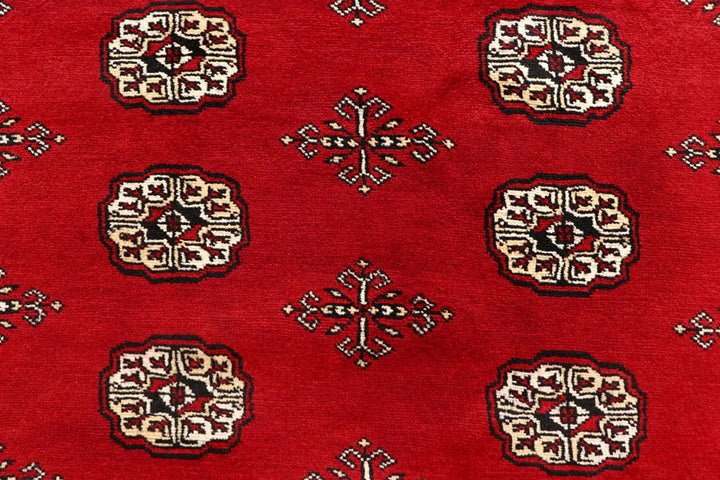 Firebrick Pakistani Bokhara Rug 6' 2" x 9' 1" Hand-Knotted | No. QA98989