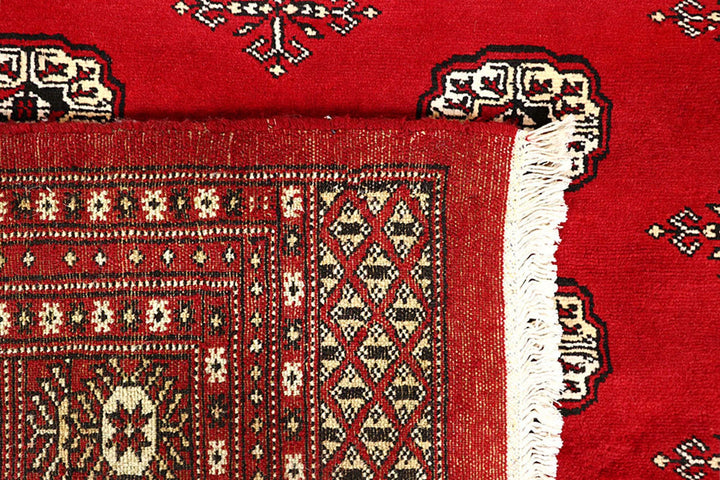 Firebrick Pakistani Bokhara Rug 6' 2" x 9' 1" Hand-Knotted | No. QA98989
