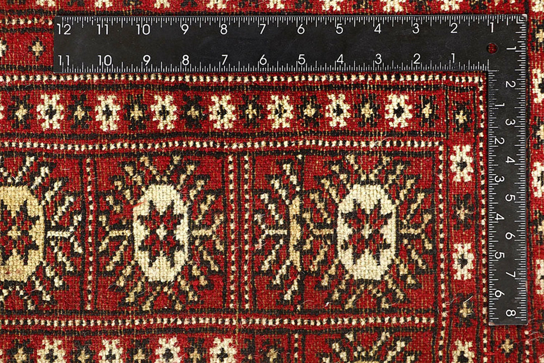 Firebrick Pakistani Bokhara Rug 6' 2" x 9' 1" Hand-Knotted | No. QA98989