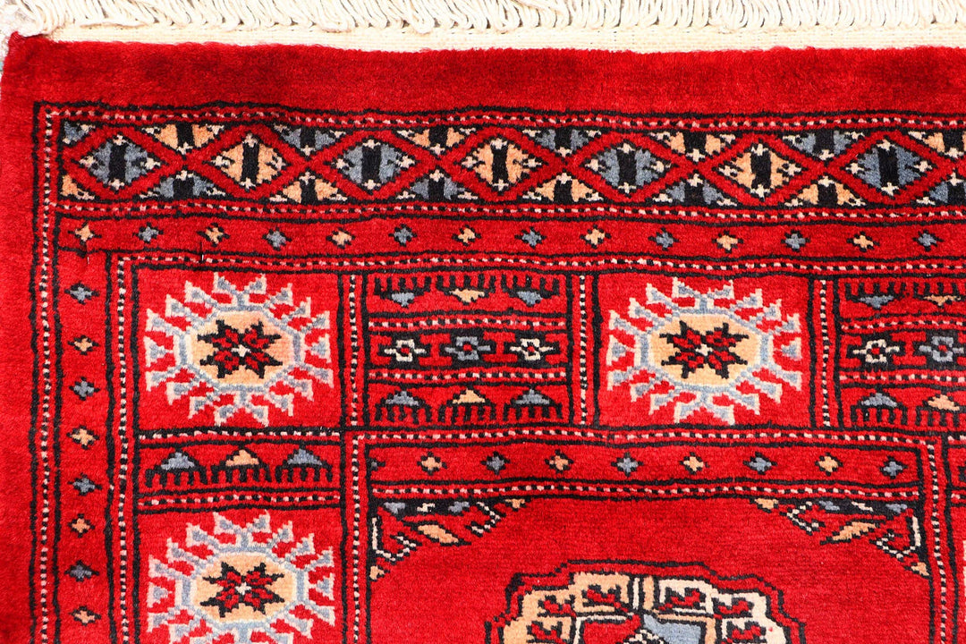 Red Pakistani Bokhara Rug 2' x 6' Hand-Knotted | No. QA99572
