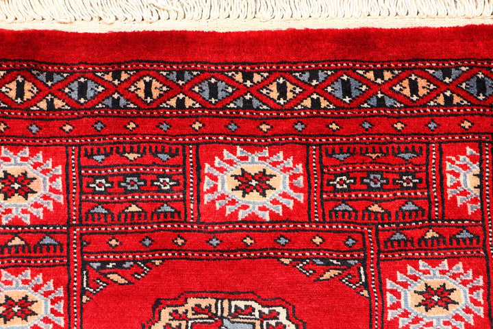 Red Pakistani Bokhara Rug 2' x 6' Hand-Knotted | No. QA99572