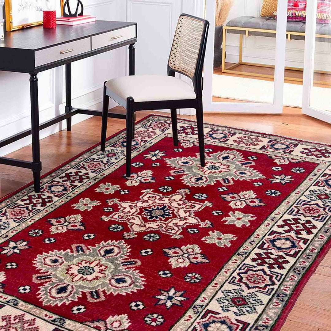 Red Afghan Kazak Rug 2' 7" x 4' 0" Hand-Knotted texture