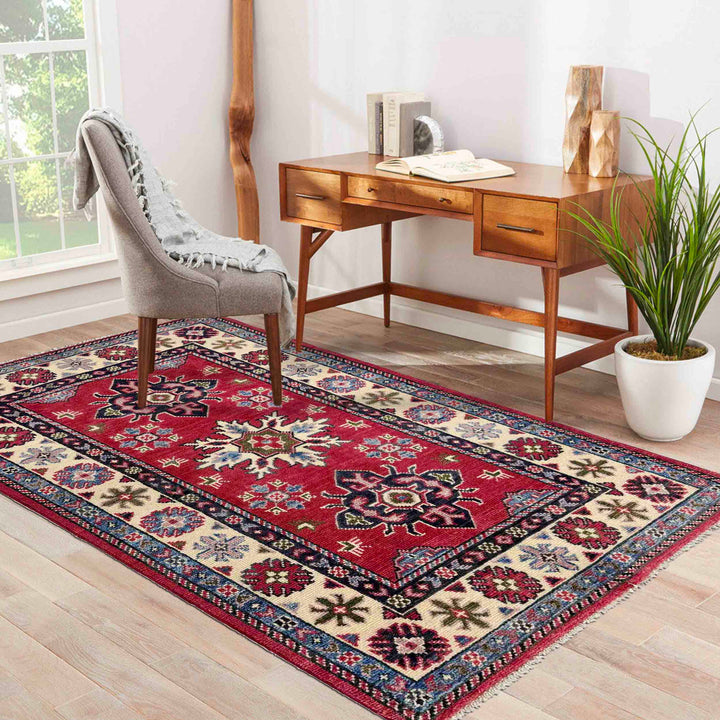 Red Afghan Kazak Rug 2' 7" x 4' 1" Hand-Knotted texture