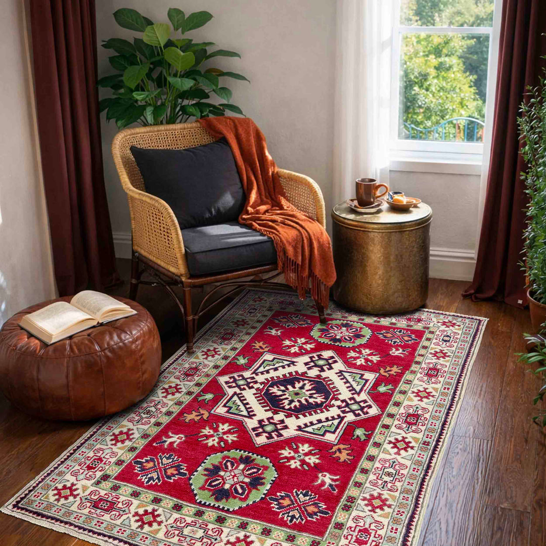 Red Afghan Kazak Rug 3' 3" x 5' 0" Hand-Knotted texture