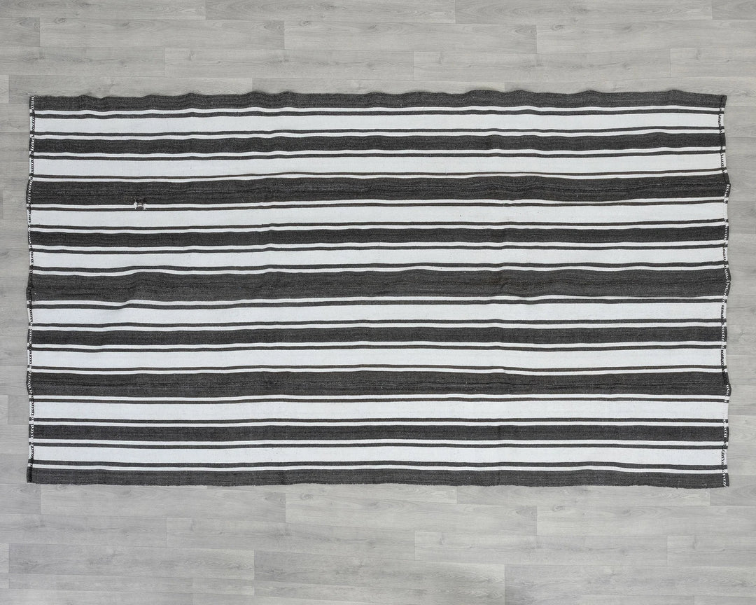 Ivory Turkish Kilim Rug 5'5" x 9'1" Flat-Weave reverse