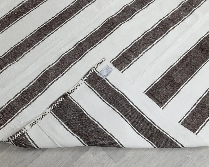 Brown Turkish Kilim Rug 5' 9" x 10' 8" Flat-Weave texture