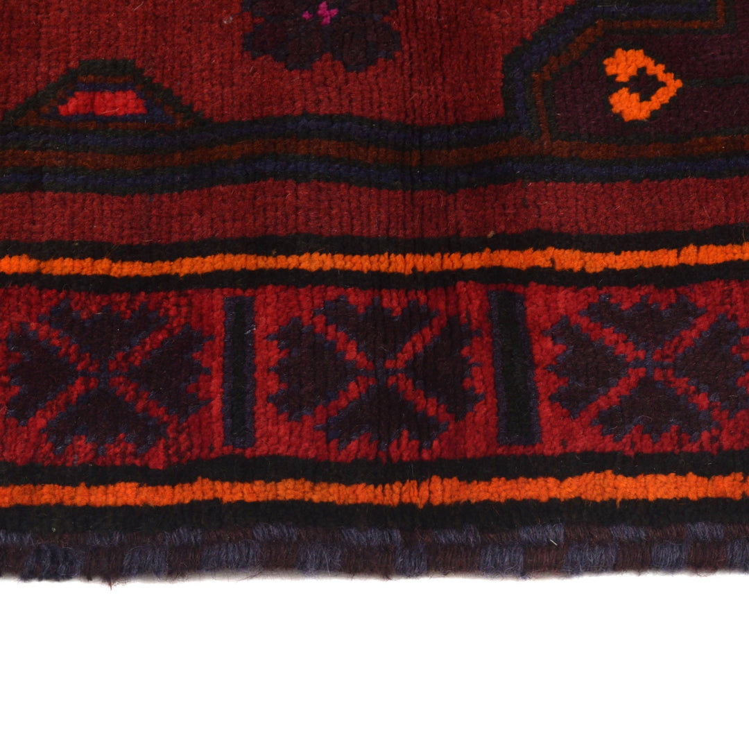 Red Afghan Baluchi Rug 4' 1" x 6' 5" Hand-Knotted detail