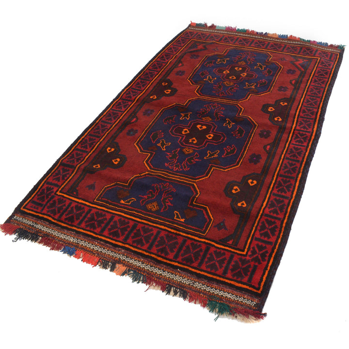 Red Afghan Baluchi Rug 4' 1" x 6' 5" Hand-Knotted close-up
