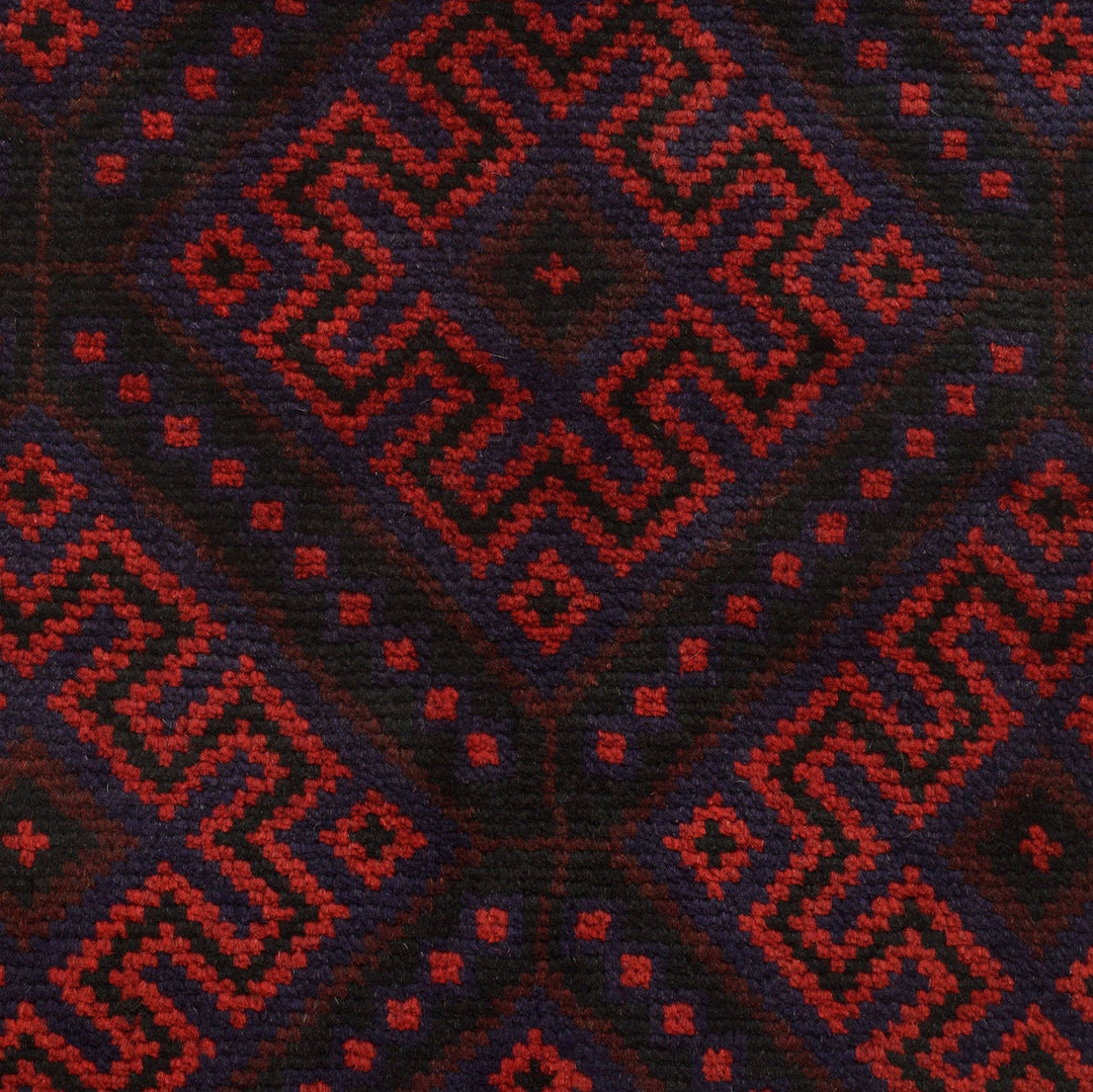 Afghan Baluchi Rug 3' 10" x 5' 9" Hand-Knotted close-up
