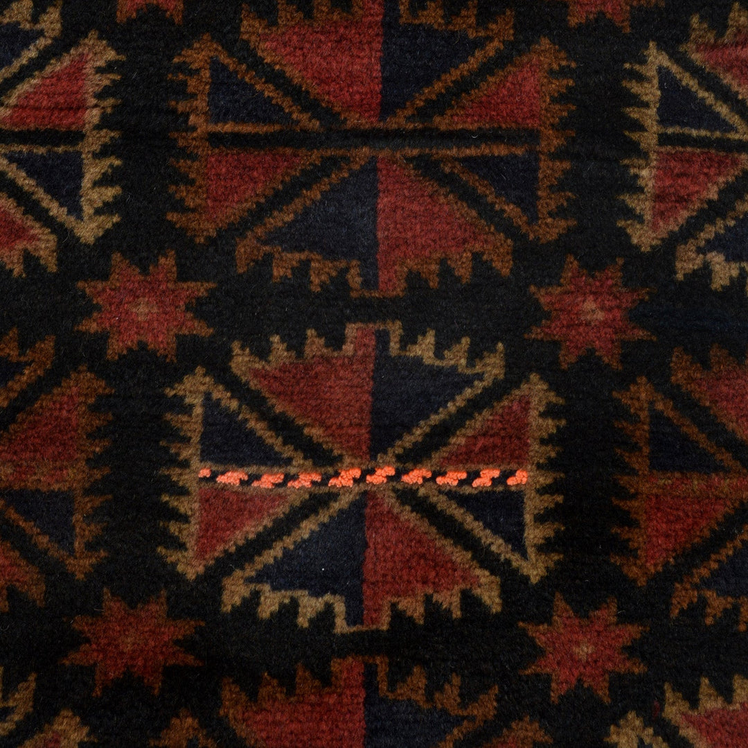 Afghan Baluchi Rug 3' 8" x 5' 12" Hand-Knotted close-up