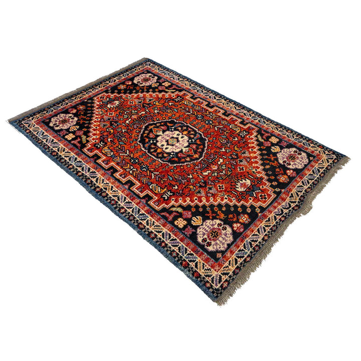 Red Afghan Oriental Rug 3' 1" x 4' 9" Hand-Knotted close-up
