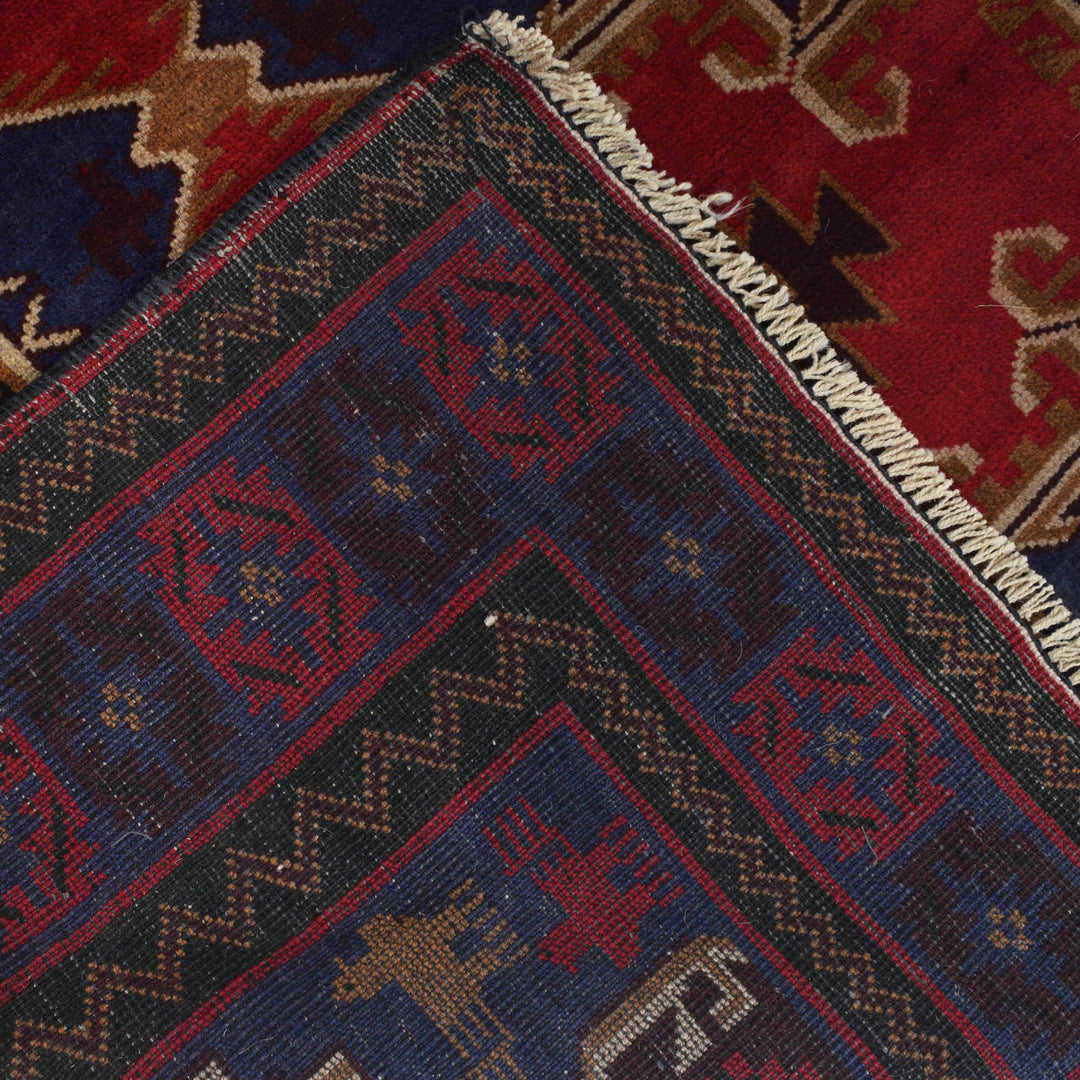 Red Afghan Baluchi Rug 4' 2" x 6' 6" Hand-Knotted border